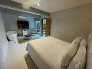 Cama ou camas em um quarto em Hiu Hotel