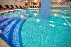 Bazén v ubytování Park Hotel Paradiso nebo v jeho okolí