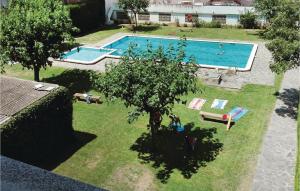 an overhead view of a swimming pool in a yard at Gorgeous Apartment In Pineda De Mar in Pineda de Mar