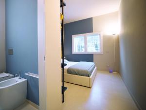 A bed or beds in a room at Nerodavola by PosarelliVillas