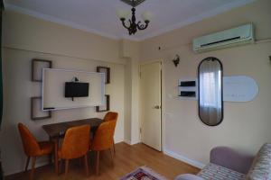 TV a/nebo společenská místnost v ubytování Stone Home Apart