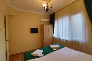 Postel nebo postele na pokoji v ubytování Stone Home Apart