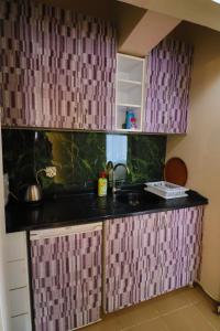 Kuchyň nebo kuchyňský kout v ubytování Stone Home Apart