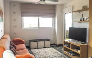 Telewizja i/lub zestaw kina domowego w obiekcie Beautiful Apartment In Isla Plana