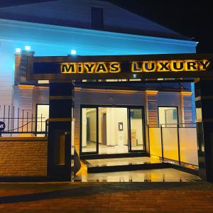 a mijas library building with a sign on it at MİYAS LUXURY HOTEL in Kemer