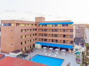 an aerial view of a hotel with a swimming pool at Golden Beach Hotel in Fortaleza