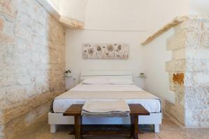 Posteľ alebo postele v izbe v ubytovaní Campanile Apartment with terrace by Wonderful Italy