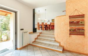 a hallway with a staircase in a house at Villa Primula in Casale Corte Cerro