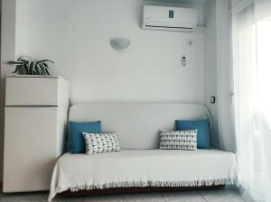 เตียงในห้องที่ Apartamento en la playa