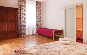 A bed or beds in a room at Villa Caterina