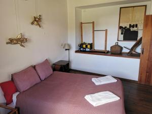 Postel nebo postele na pokoji v ubytování Hostel Argonauta