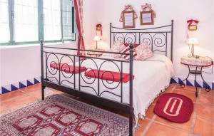 A bed or beds in a room at Nice Home In Arcos De La Frontera With 2 Bedrooms And Wifi