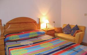 A bed or beds in a room at Amazing Apartment In Orihuela Costa