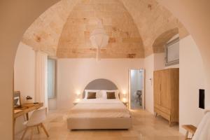 A bed or beds in a room at Palazzo Manzoni by MANZONI COLLECTION
