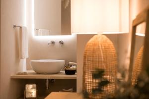 A bathroom at Palazzo Manzoni by MANZONI COLLECTION