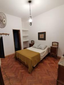 Katil atau katil-katil dalam bilik di Terraza de la Usina