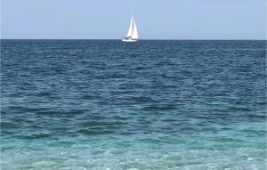 a sail boat in the middle of the ocean at Bilo 4 in Orosei