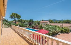 a balcony of a house with a swimming pool at Beautiful Home In Torremanzanas With Wifi in Torremanzanas