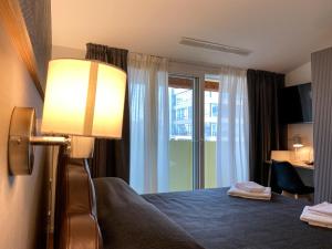 Posteľ alebo postele v izbe v ubytovaní Villino Milano