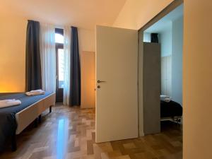 Posteľ alebo postele v izbe v ubytovaní Villino Milano