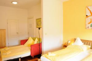 Postel nebo postele na pokoji v ubytování Hotel zur alten Stadtmauer
