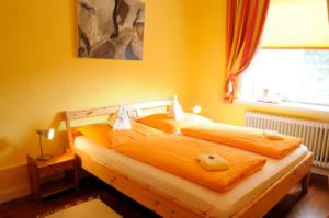 Postel nebo postele na pokoji v ubytování Hotel zur alten Stadtmauer