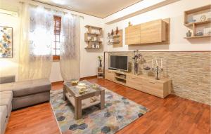 Televiisor ja/või meelelahutuskeskus majutusasutuses Beautiful Apartment In Palermo Pa