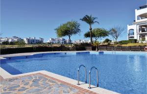 a large swimming pool in a resort with buildings at Beautiful Apartment In Sucina With Wifi in Sucina