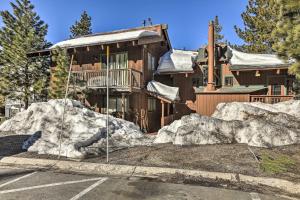 a house with snow in front of it at Tahoe Area Townhome Less Than 1 Mi to Heavenly Lifts! in Stateline