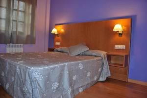 Postel nebo postele na pokoji v ubytování Aparthotel Peña Telera Resort