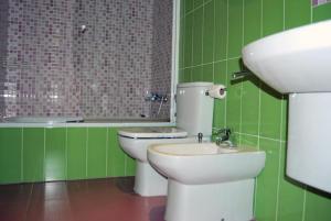 Koupelna v ubytování Aparthotel Peña Telera Resort + 13 fotografií