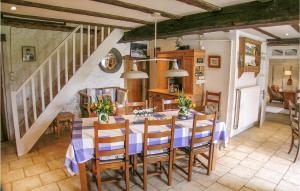 a dining room with a table and chairs at Awesome Home In Suaux With 6 Bedrooms, Wifi And Private Swimming Pool in Chichiat