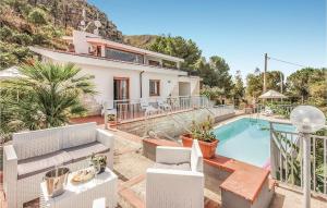 a villa with a swimming pool and a house at Villa Belvedere in Castellammare del Golfo