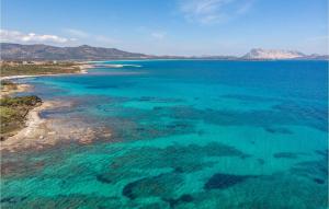 an aerial view of a beach with turquoise water at Trilo 6 in San Teodoro