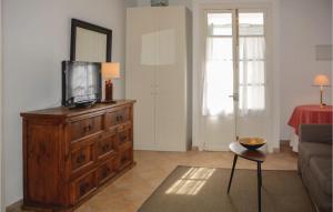 Televízia a/alebo spoločenská miestnosť v ubytovaní Lovely Home In Palma De Mallorca