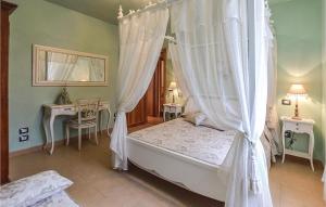Giường trong phòng chung tại Villetta Toscana