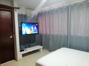 TV i/ili multimedijalni sistem u objektu Apartamento mar