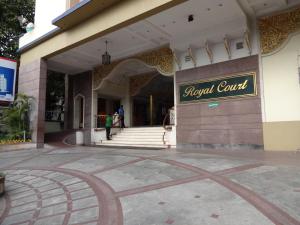 a building with a sign that reads stupid court at Royal Court in Madurai