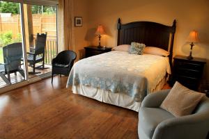 Säng eller sängar i ett rum på Ocean Mist Guesthouse