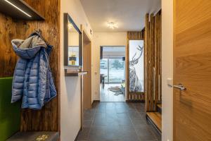 Postel nebo postele na pokoji v ubytování Alpenlodge Bad Mitterndorf