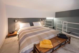 Posteľ alebo postele v izbe v ubytovaní Loft 19