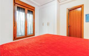 A bed or beds in a room at Lovely Apartment In Algorfa With Wifi