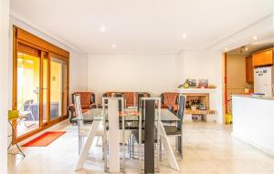 A kitchen or kitchenette at Lovely Apartment In Algorfa With Wifi