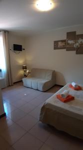 Postel nebo postele na pokoji v ubytování Villa Leilani B&B