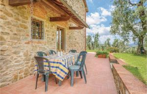 a table and chairs sitting on a patio at Leccino in Lamporecchio