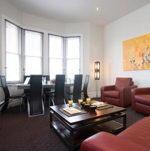 a living room with a table and chairs at Auldington Hotel in Launceston