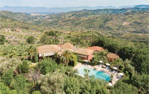 an aerial view of a house with a swimming pool at Apt 6 in Laureana Cilento
