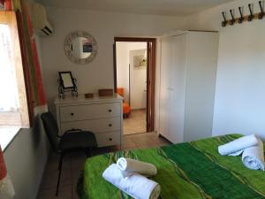 Posteľ alebo postele v izbe v ubytovaní Porta Nuove Vacanze