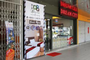 a store front of a dream city store with a sign at Dream City in Kuching