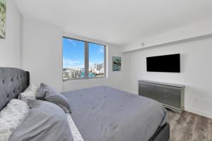 Postel nebo postele na pokoji v ubytování Three-Bedroom Beachwalk Resort Apartment + 31 fotografií